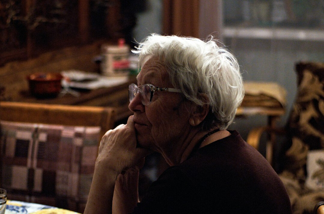 elderly person reflecting