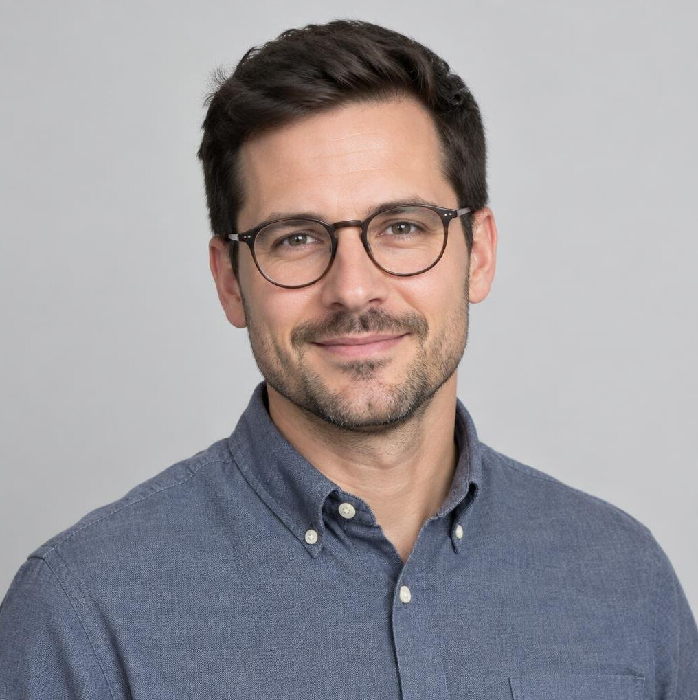 Studio portrait of a German male data analyst with dark hair